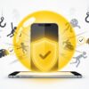 中央のスマートフォンが、ノートンを象徴する鮮やかな黄色の球体シールドで保護されているイラスト。フィッシング詐欺などのデジタルの脅威が盾に弾かれ、チェックマークが表示されている。スマホの総合的なセキュリティ対策を表現しています。